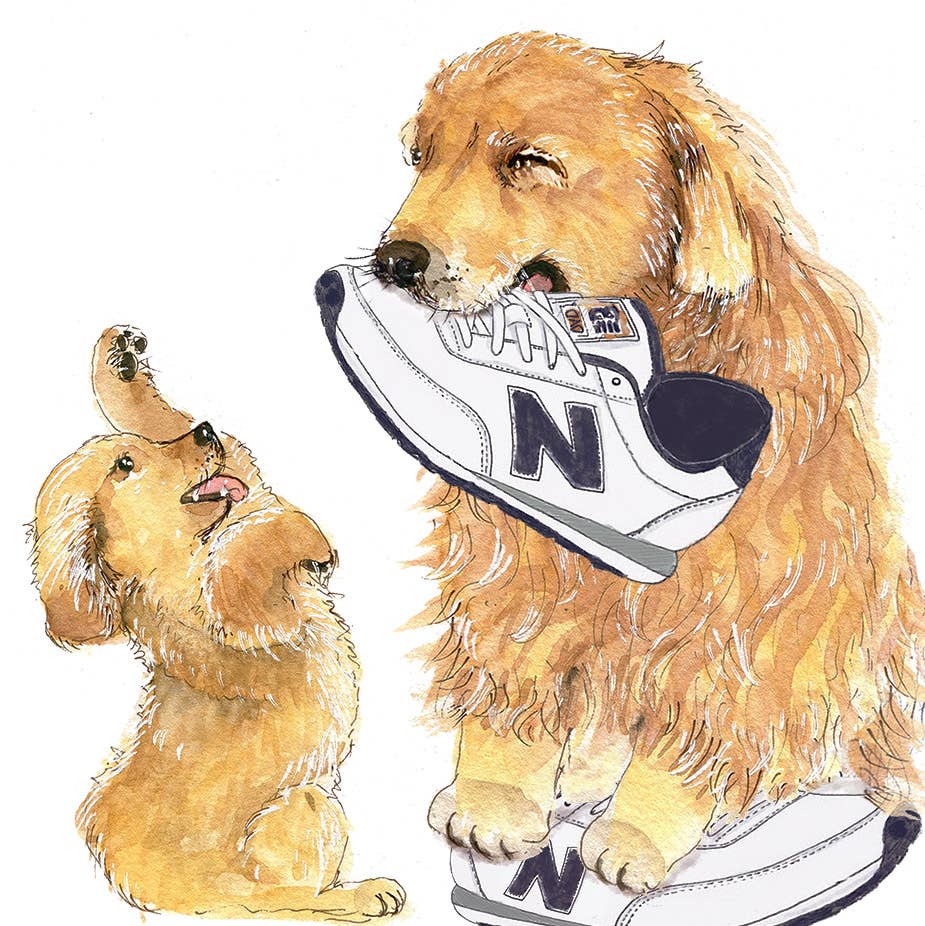A golden retriever puppy holding a shoe, with another puppy looking up, showcasing a unique Father’s Day card.
