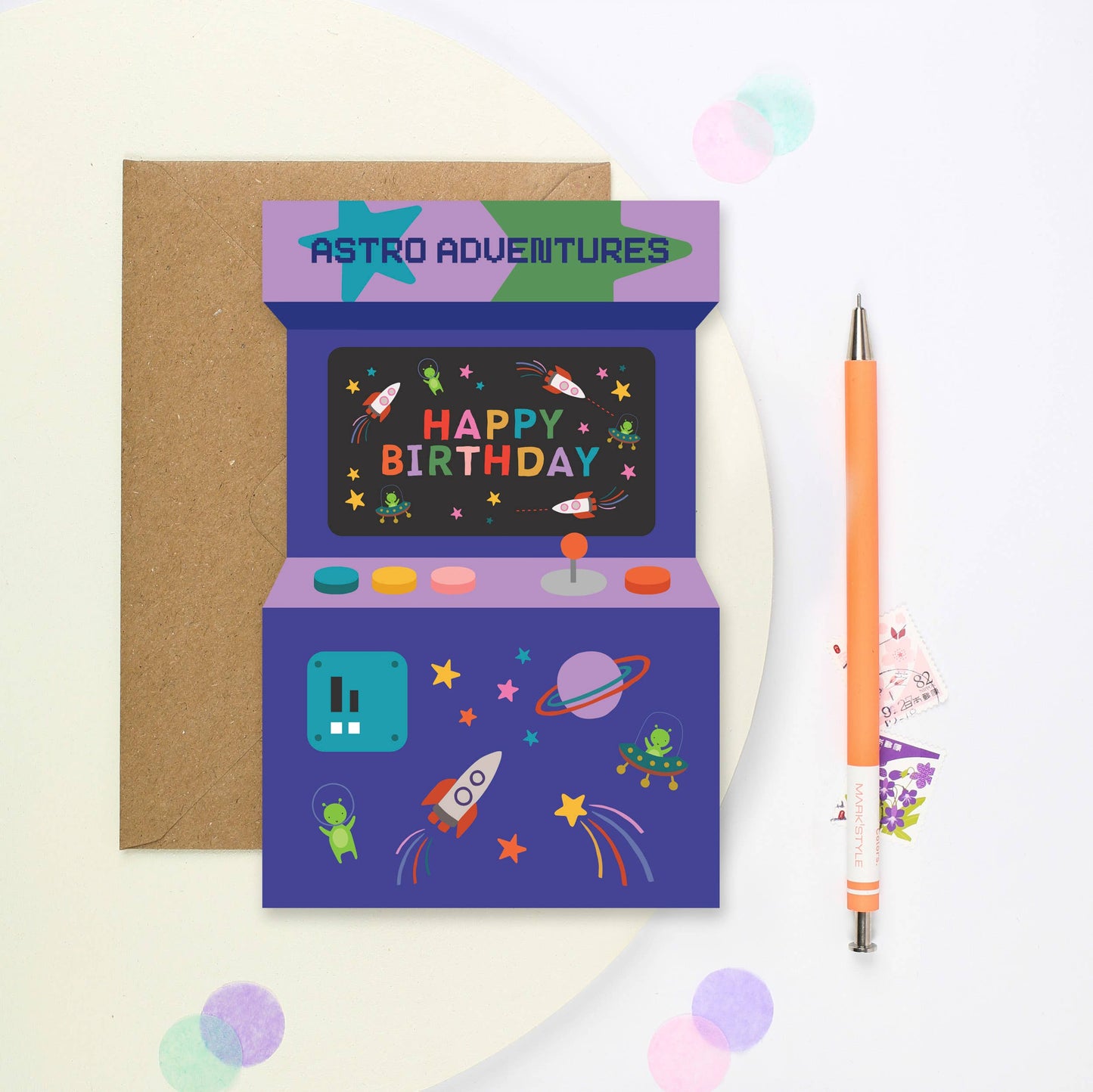 Arcade-shaped birthday card with space-themed graphics and bright colors