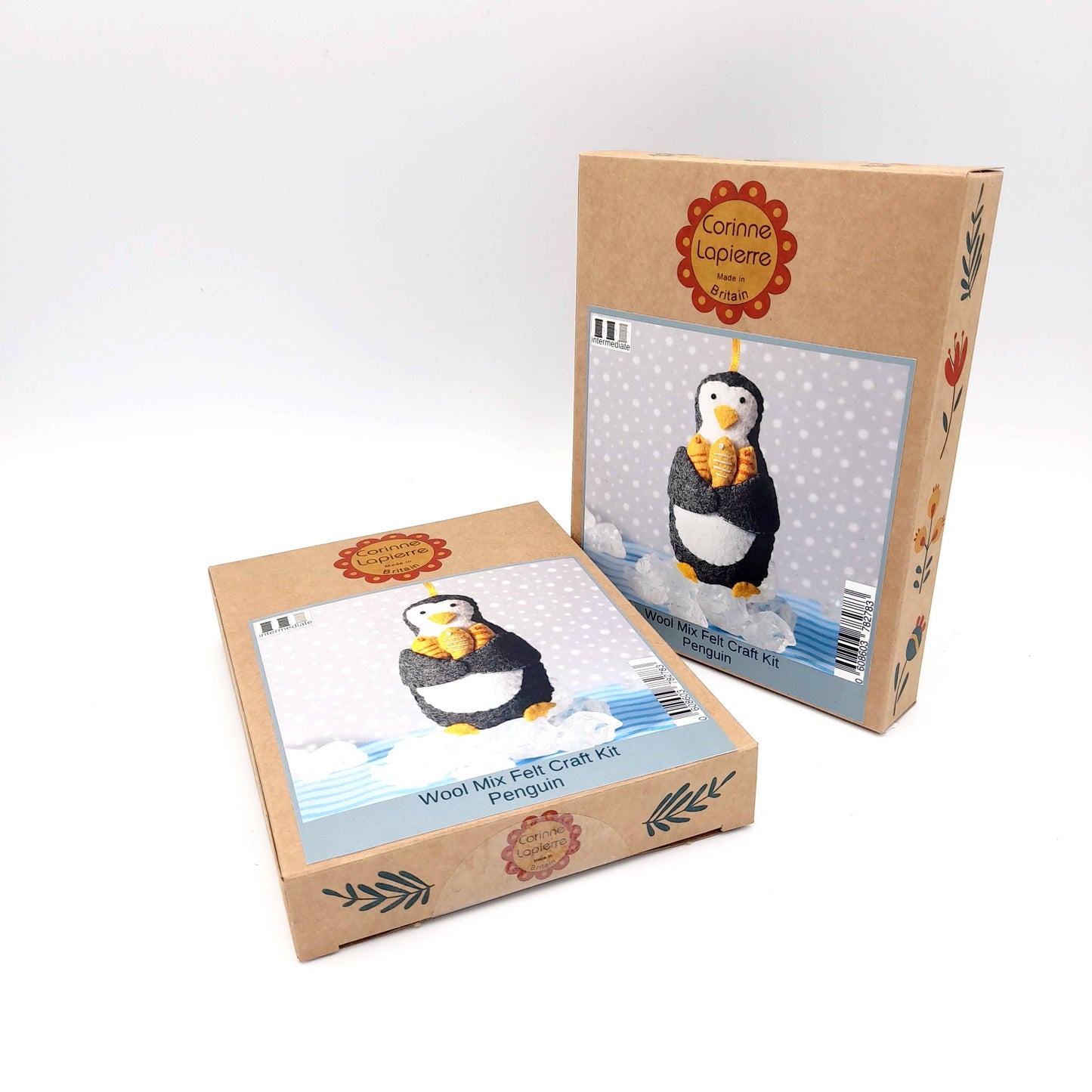 Cute penguin felt craft kit for making a hanging decoration, featuring a black and white penguin with orange feet.