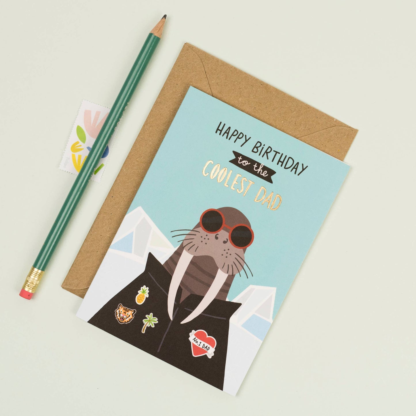 Birthday card with a stylish walrus in sunglasses, gold foil text, and fun stickers for the coolest dad.