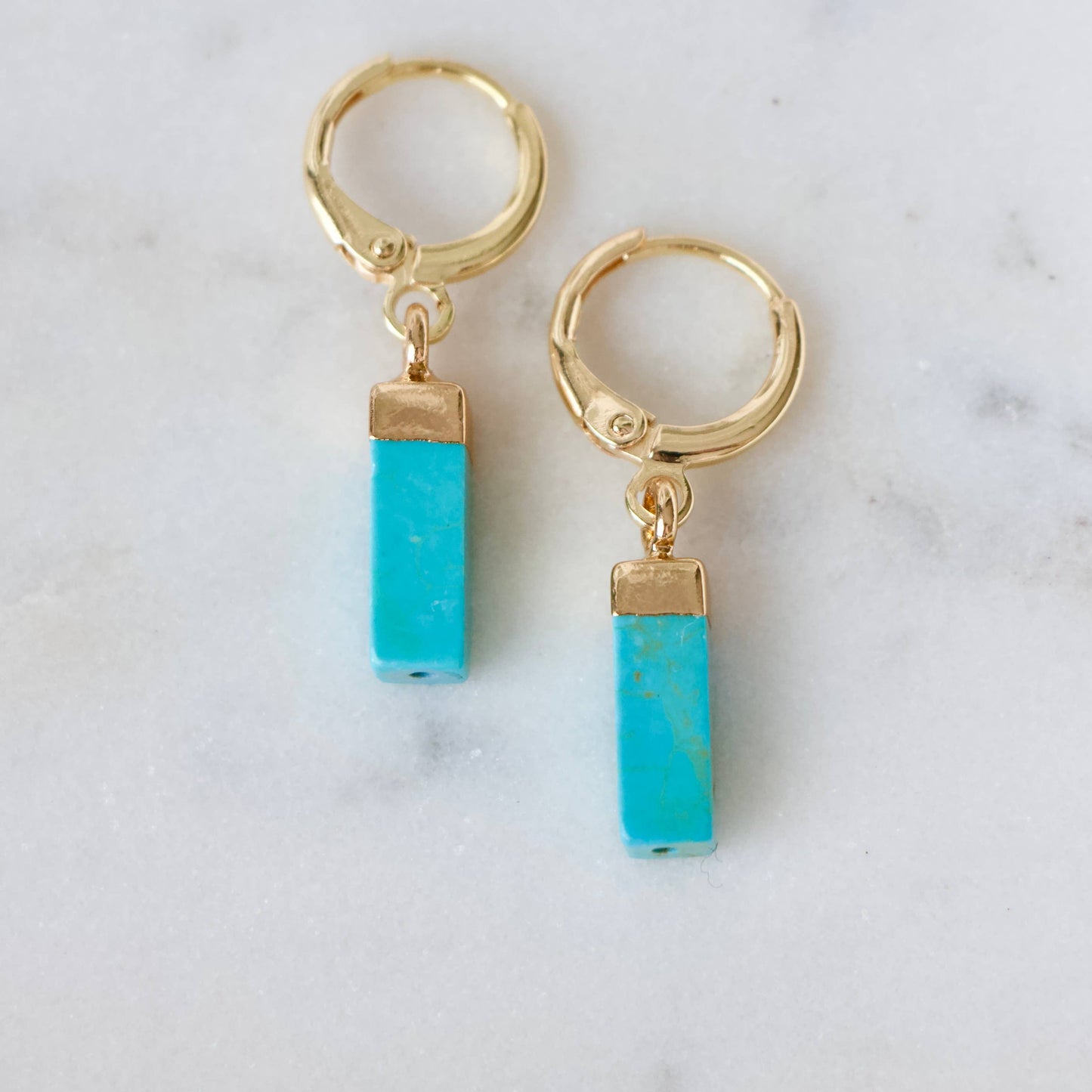 Gold huggie earrings with rectangular turquoise stone charms