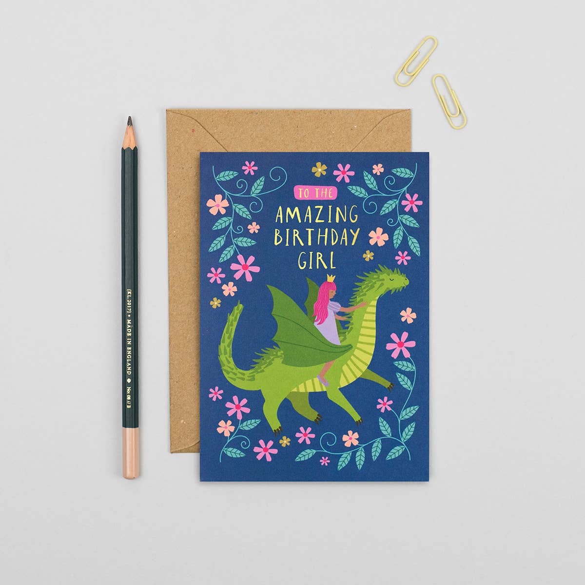 Kids birthday card with princess on green dragon and floral design