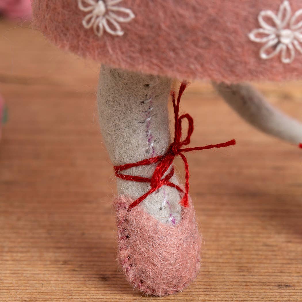 Handmade felt ballet dancer mouse with pink tutu and red ribbon-tied shoes, perfect for crafting.