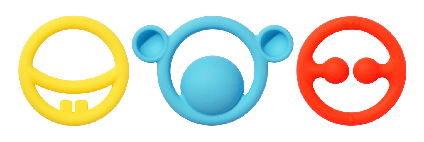 Bright yellow, blue, and red silicone teething rings with playful shapes and textures for baby comfort.