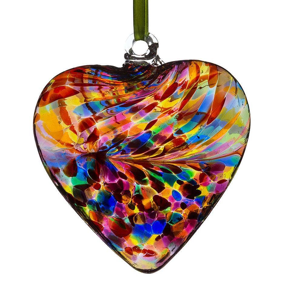 Multicoloured glass heart ornament with swirling rainbow pattern