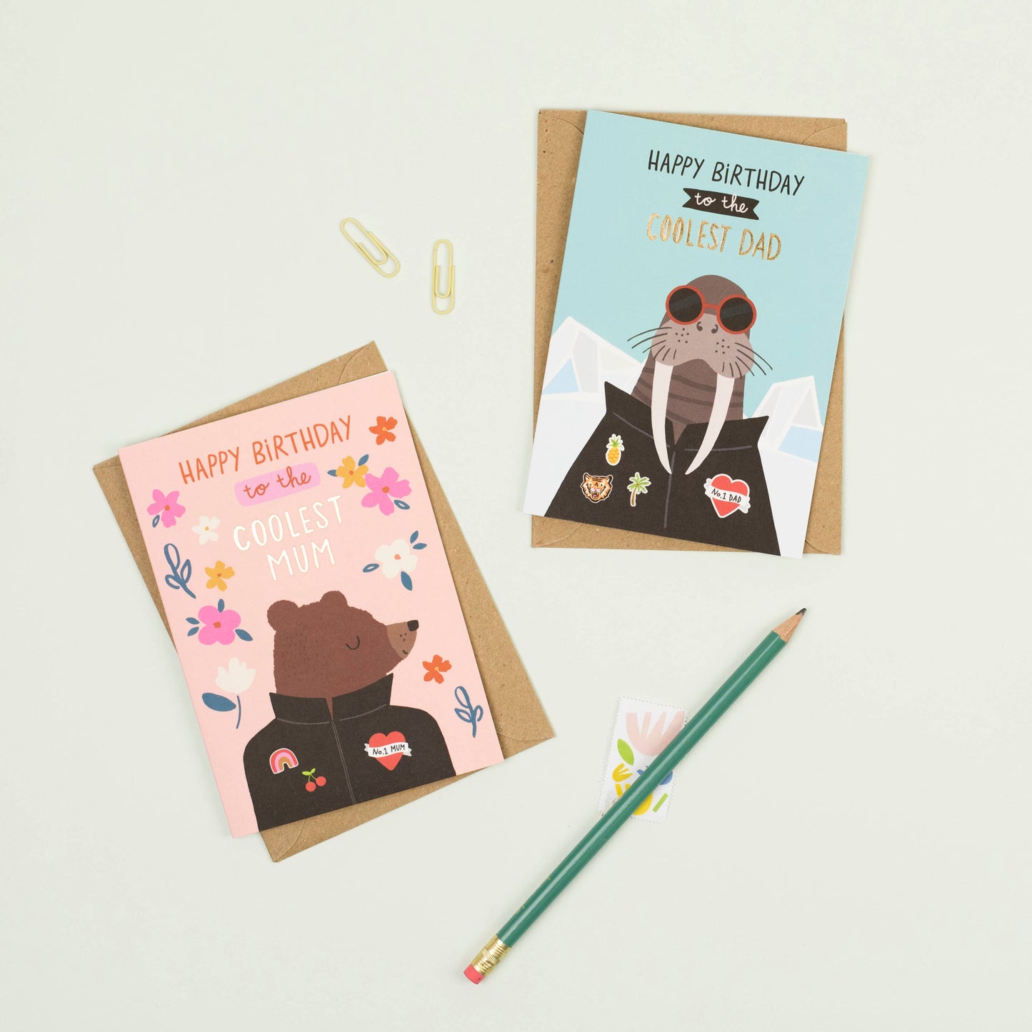 A cute illustrated bear birthday card for the coolest mum, featuring colorful flowers and a heart patch.