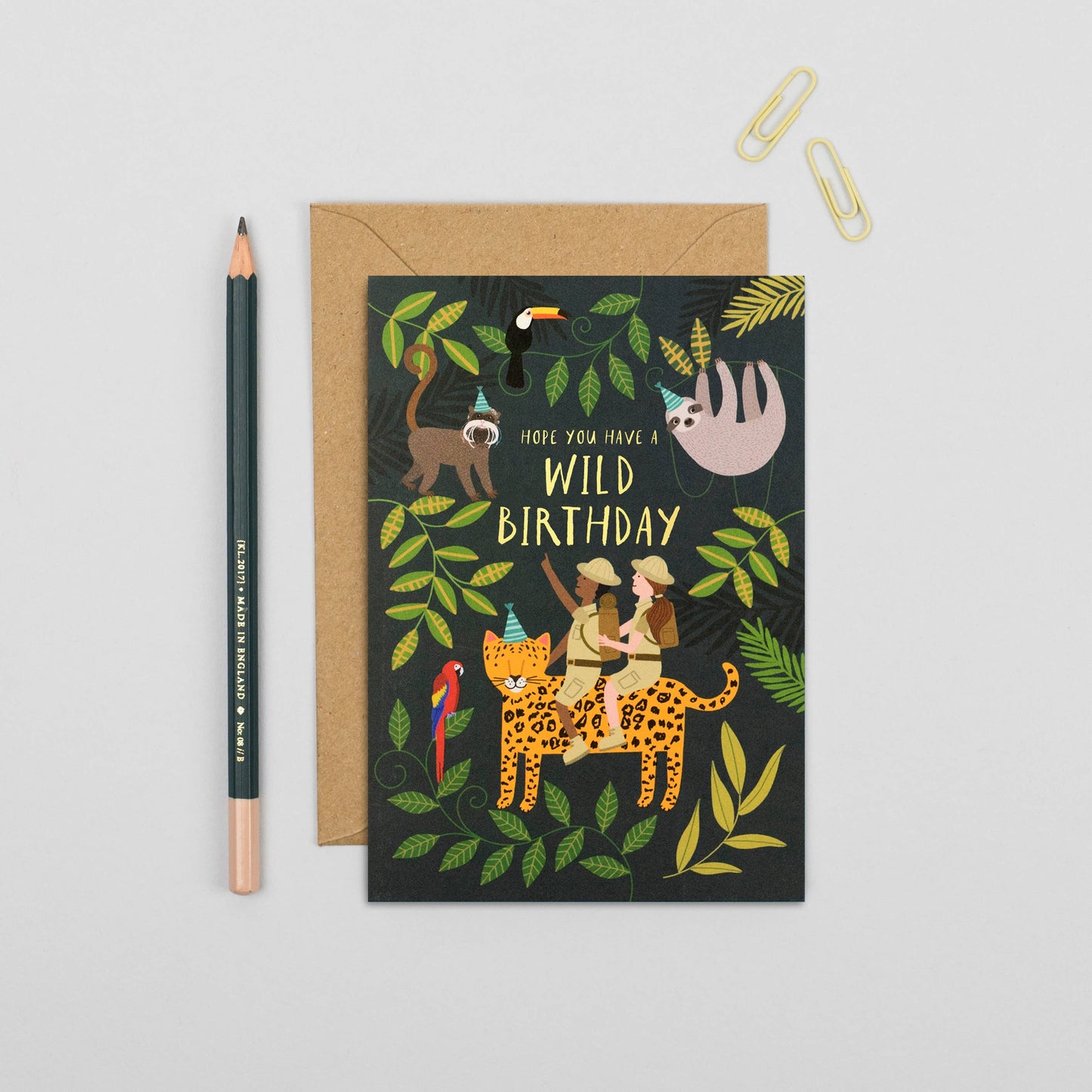 Jungle-themed kids birthday card with explorers and party animals