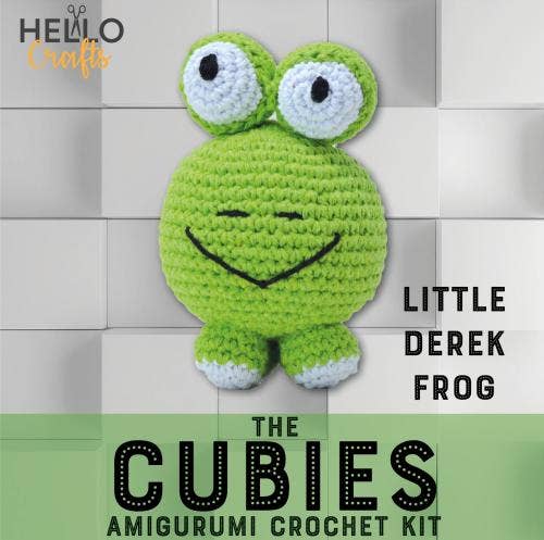 Crochet kit for Little Derek, a green frog with big eyes and a smile, perfect for DIY crafting.