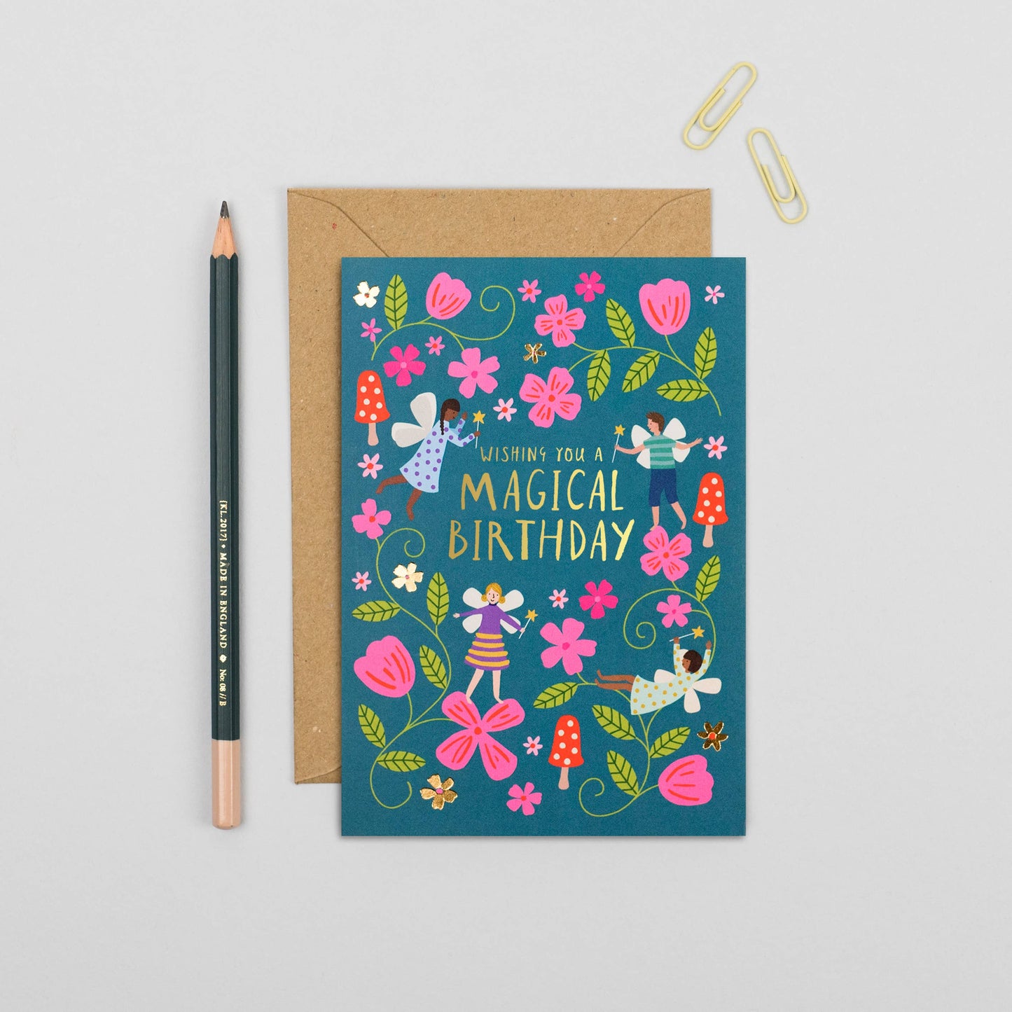 Illustrated fairy garden birthday card with pink flowers and gold foil details