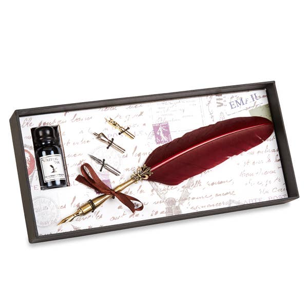 Brass feather quill pen set with dark red feather, ink bottle, and nibs in gift box