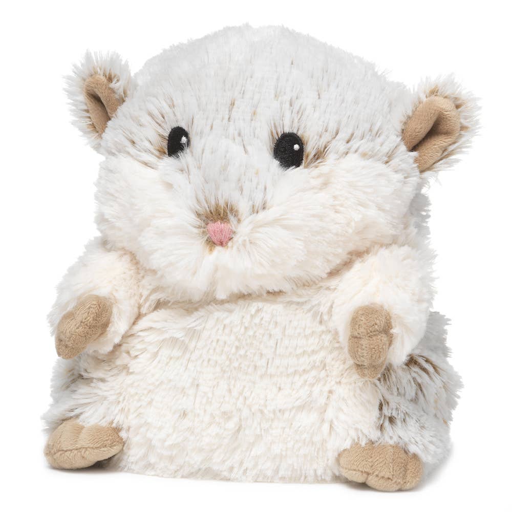 Fluffy cream-colored plush hamster with round body and pink nose