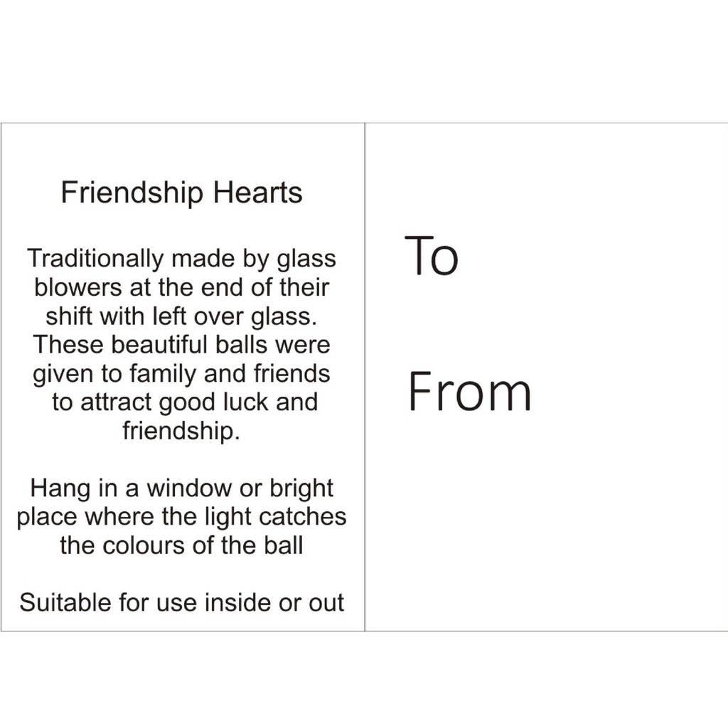 A blue and pink glass heart ornament, perfect for hanging and catching light, symbolizing friendship and good luck.