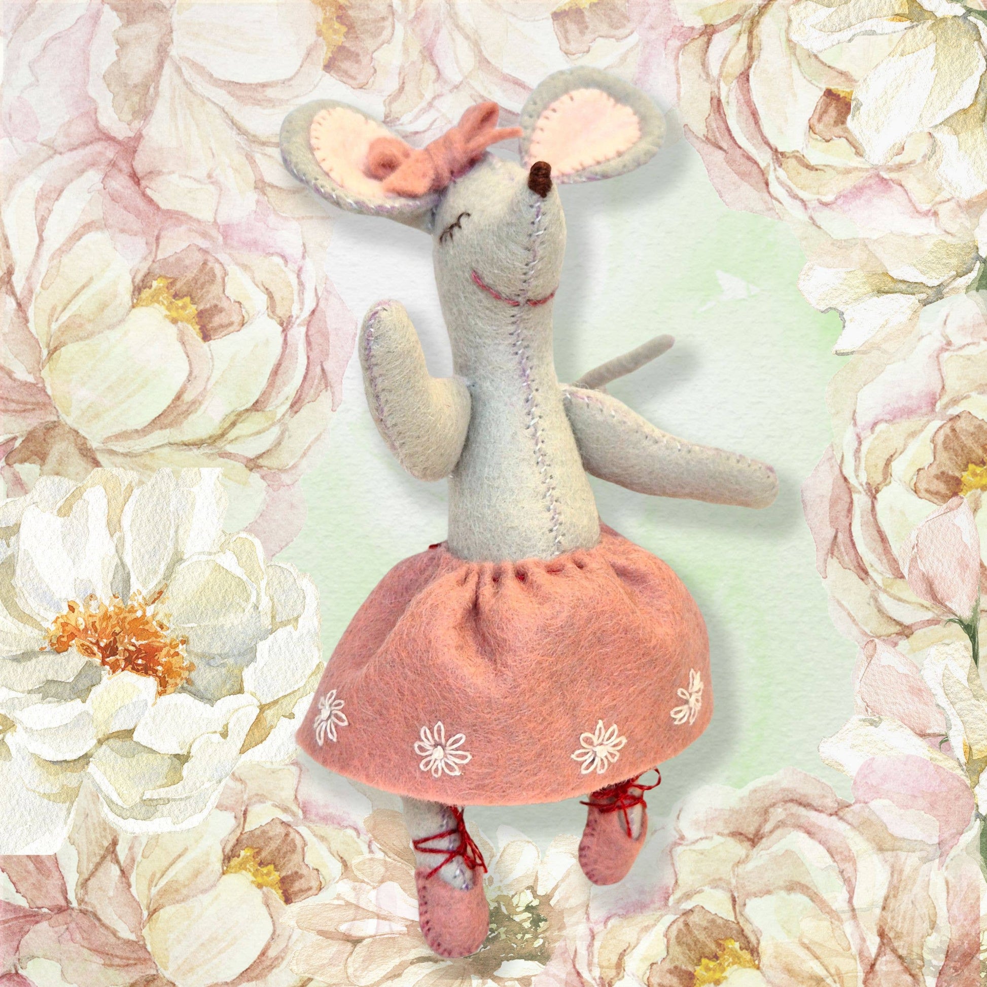 Handmade felt mouse in a pink tutu and ballet shoes, perfect for crafting and play.