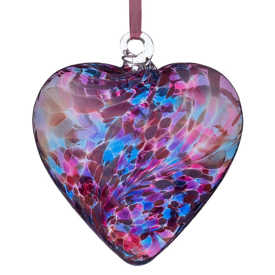 Mouth-blown glass heart ornament in blue and pink tones with ribbon loop