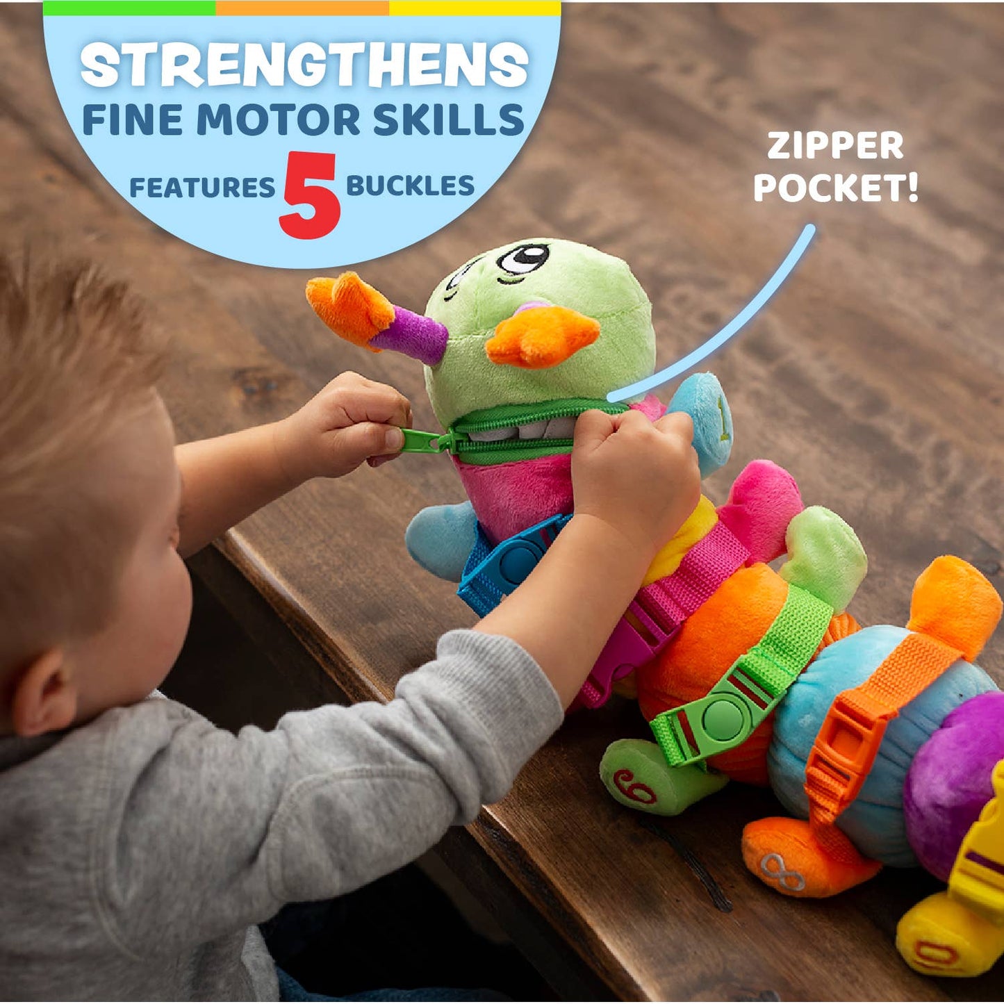 Colorful plush caterpillar toy with buckles and a zipper pocket, perfect for fine motor skills.