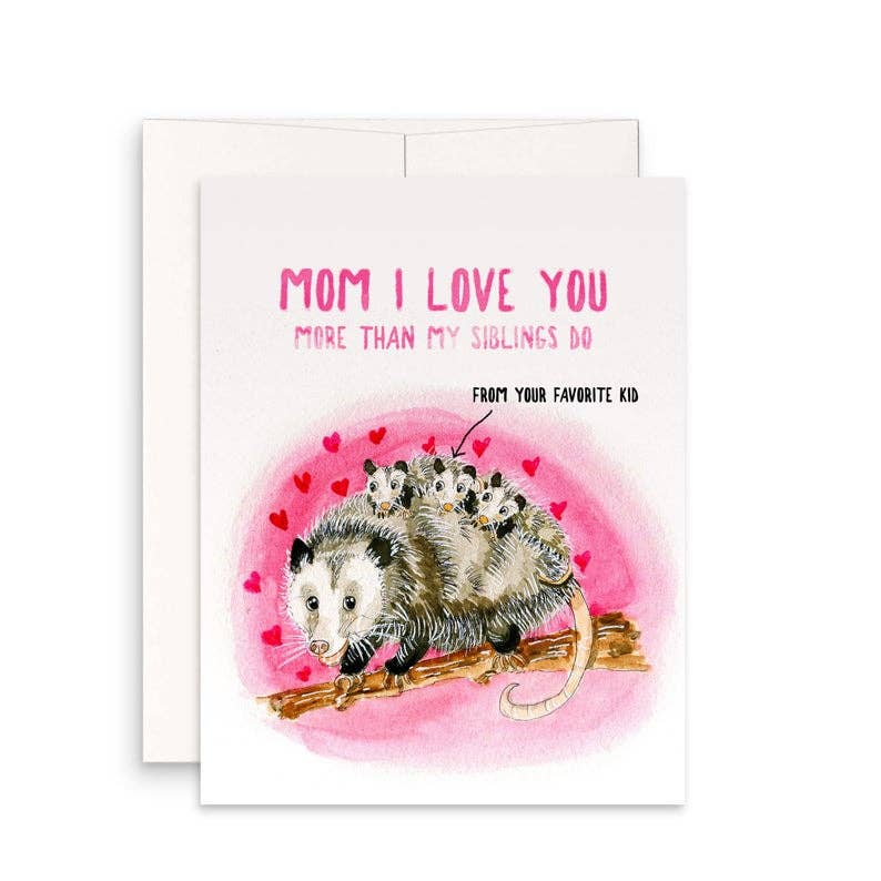 A handmade card featuring a possum family on a branch, with the message "Mom I love you more than my siblings do" and hearts.