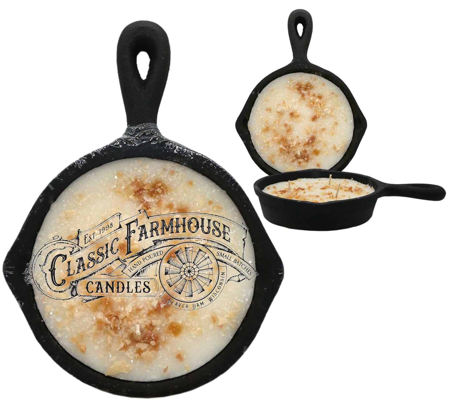 Three-wick candle in black cast iron skillet with brown wax toppings resembling latte foam and nuts, labeled "Hazelnut Latte".