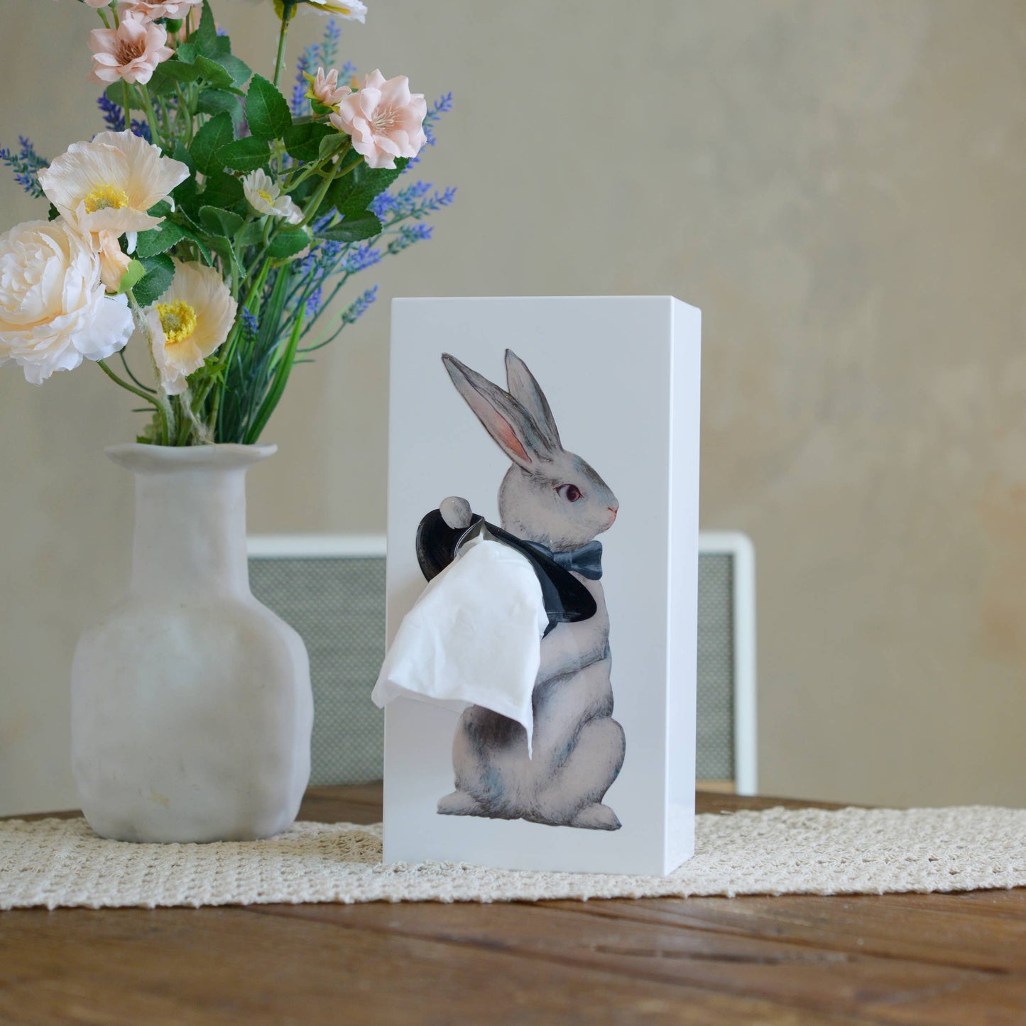 A white tissue box with a pop art resin design featuring a stylish rabbit in a bow tie.