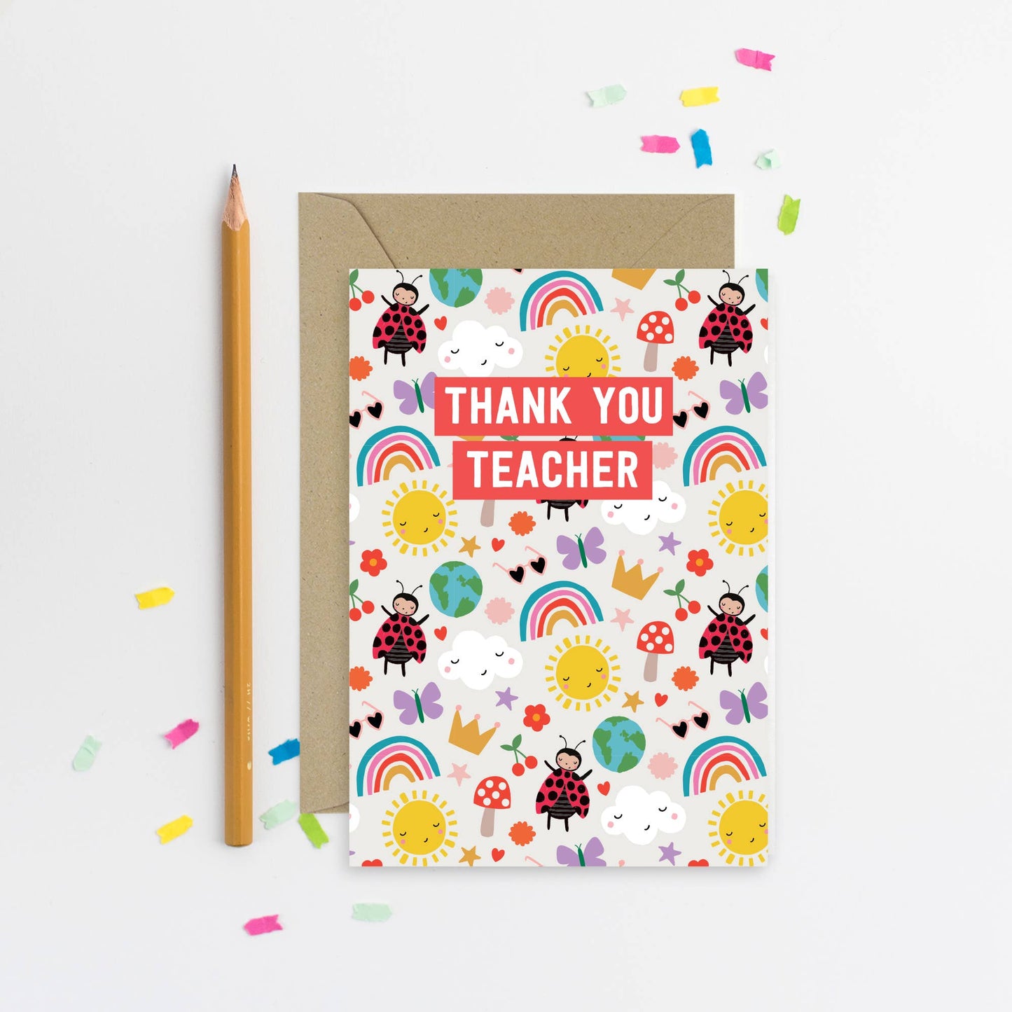 Colorful thank you card with rainbows, ladybirds, suns, and clouds