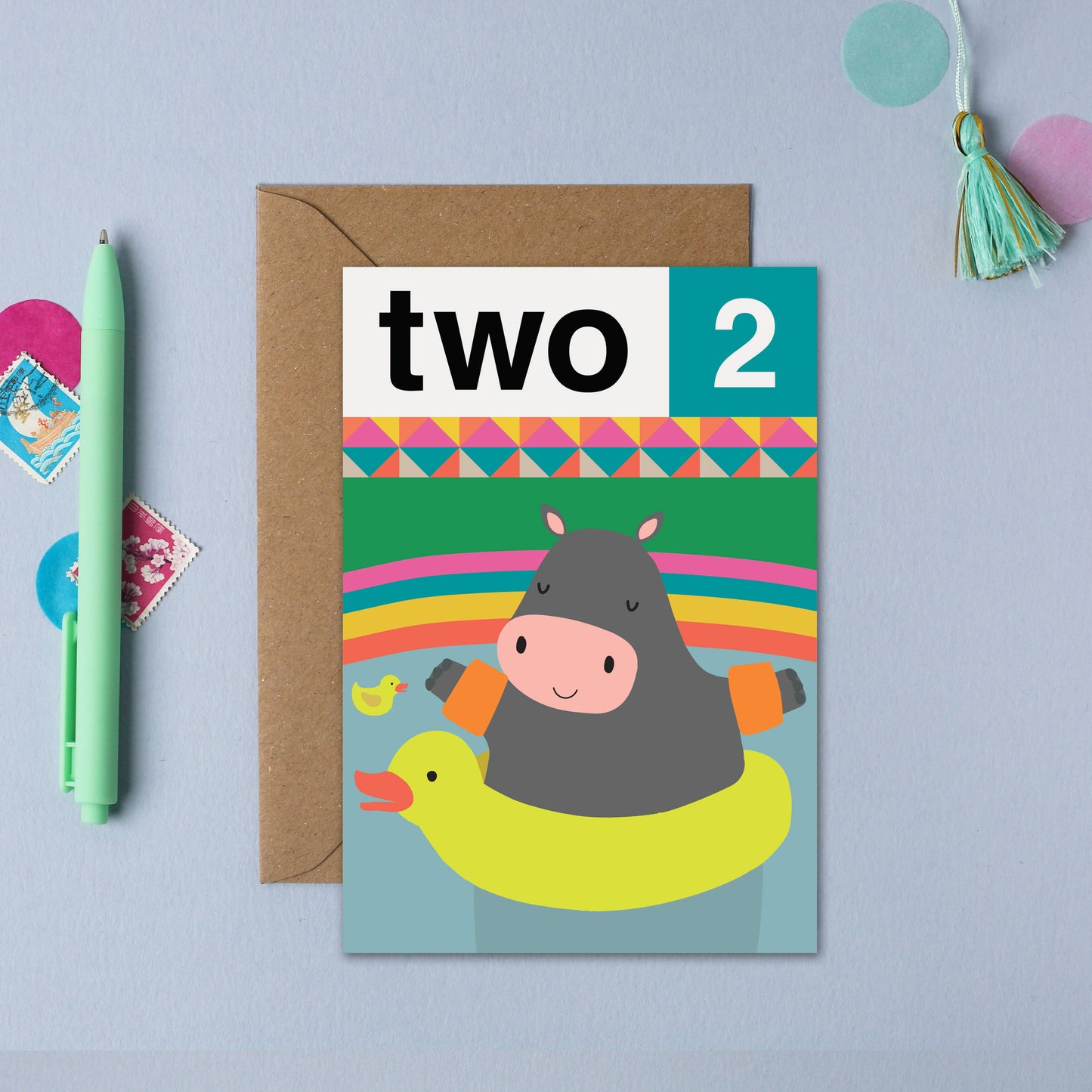 Illustrated children's card with a happy hippo in a duck float and bold 'two 2' caption