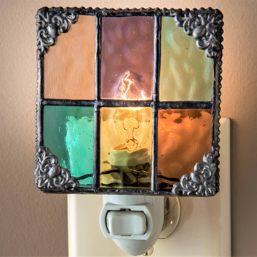 Colorful stained glass night light with filigree corner accents