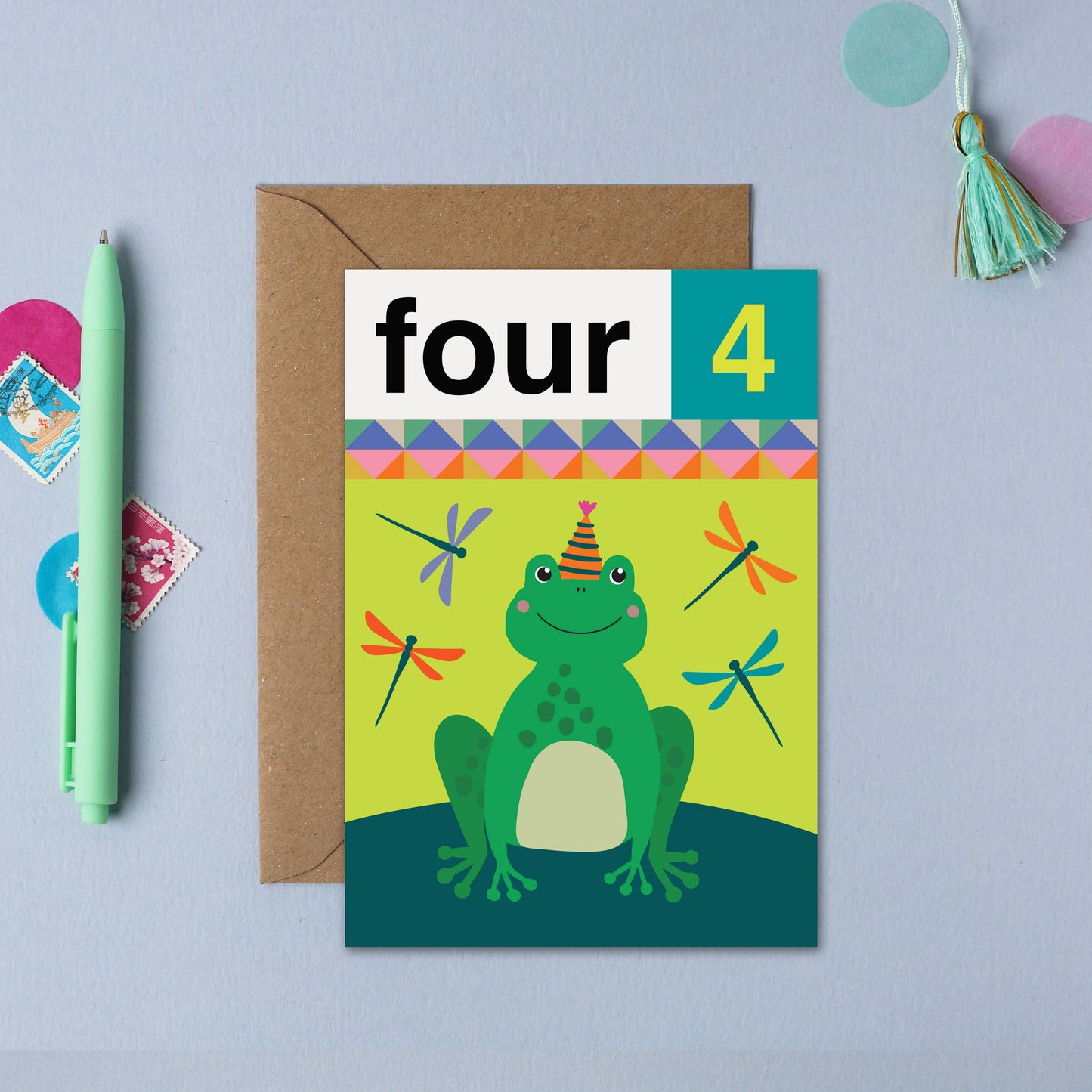 Children’s 4th birthday card with a smiling frog and dragonflies