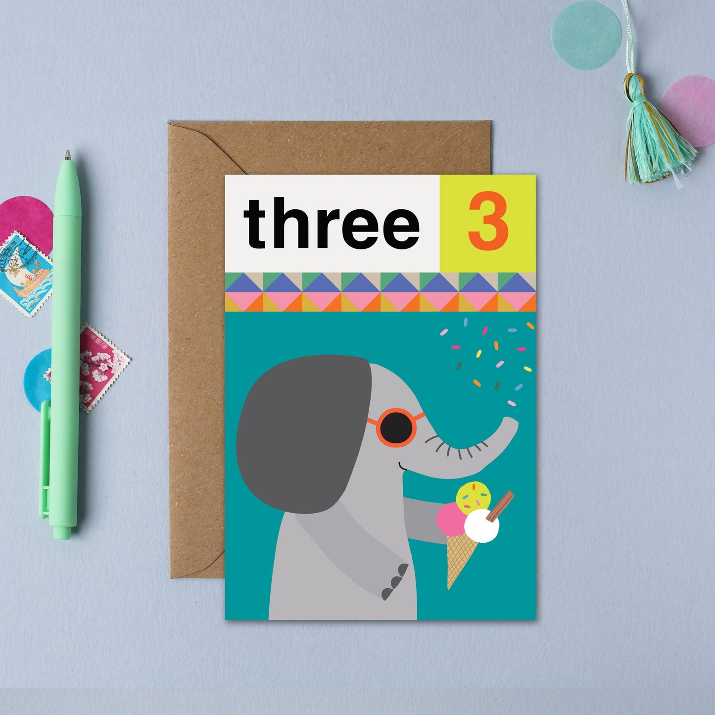 A colorful birthday card for age 3 featuring a playful elephant holding an ice cream cone.