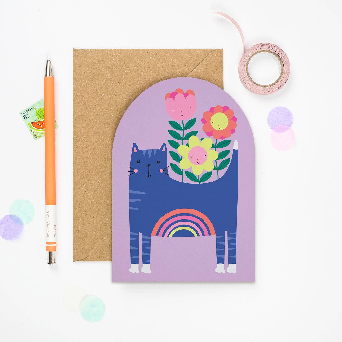 Arched lilac card featuring a blue cat with a rainbow and colorful flowers, perfect for unique gifts.