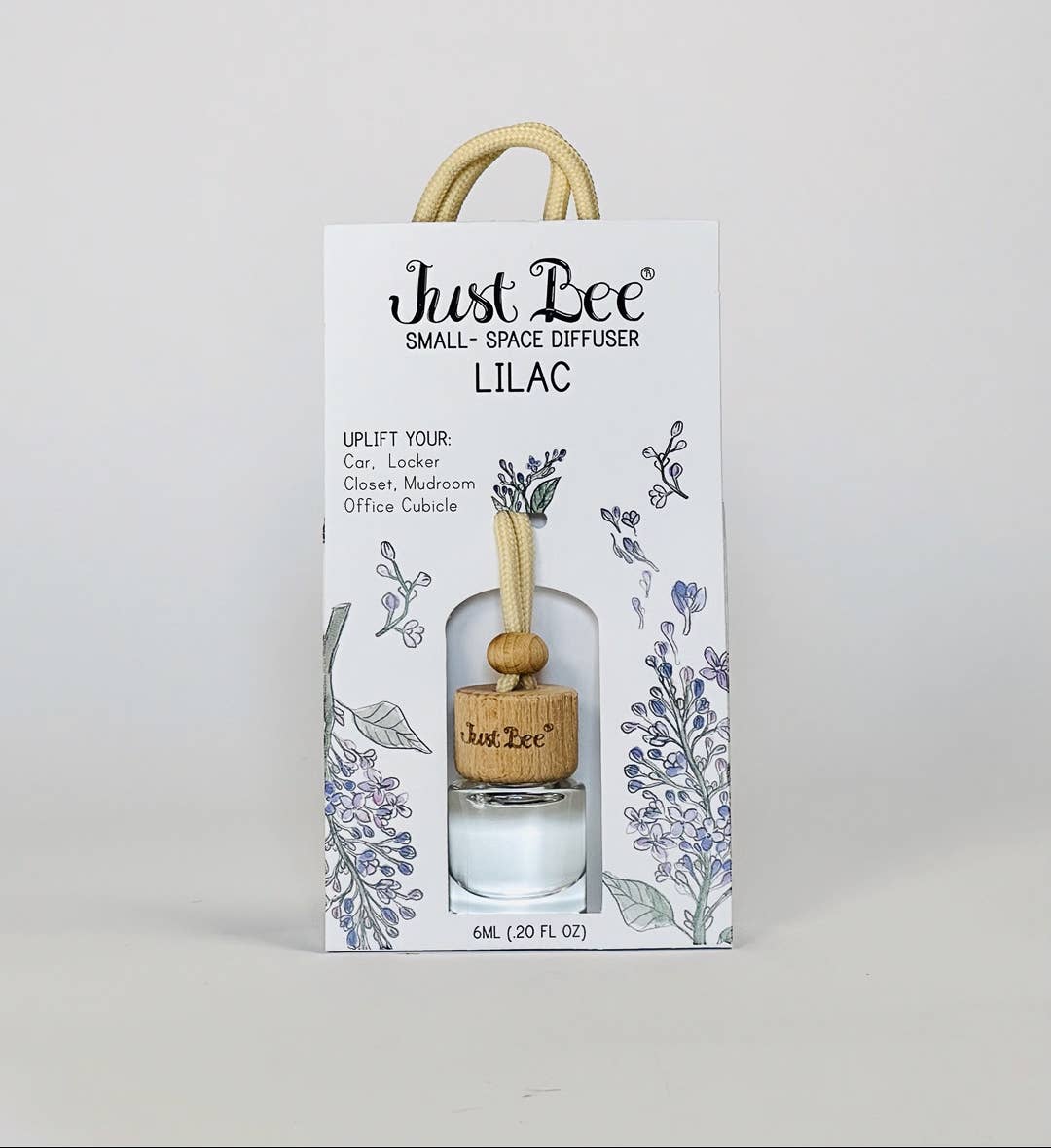 Lilac-scented hanging glass diffuser with wood lid in floral packaging