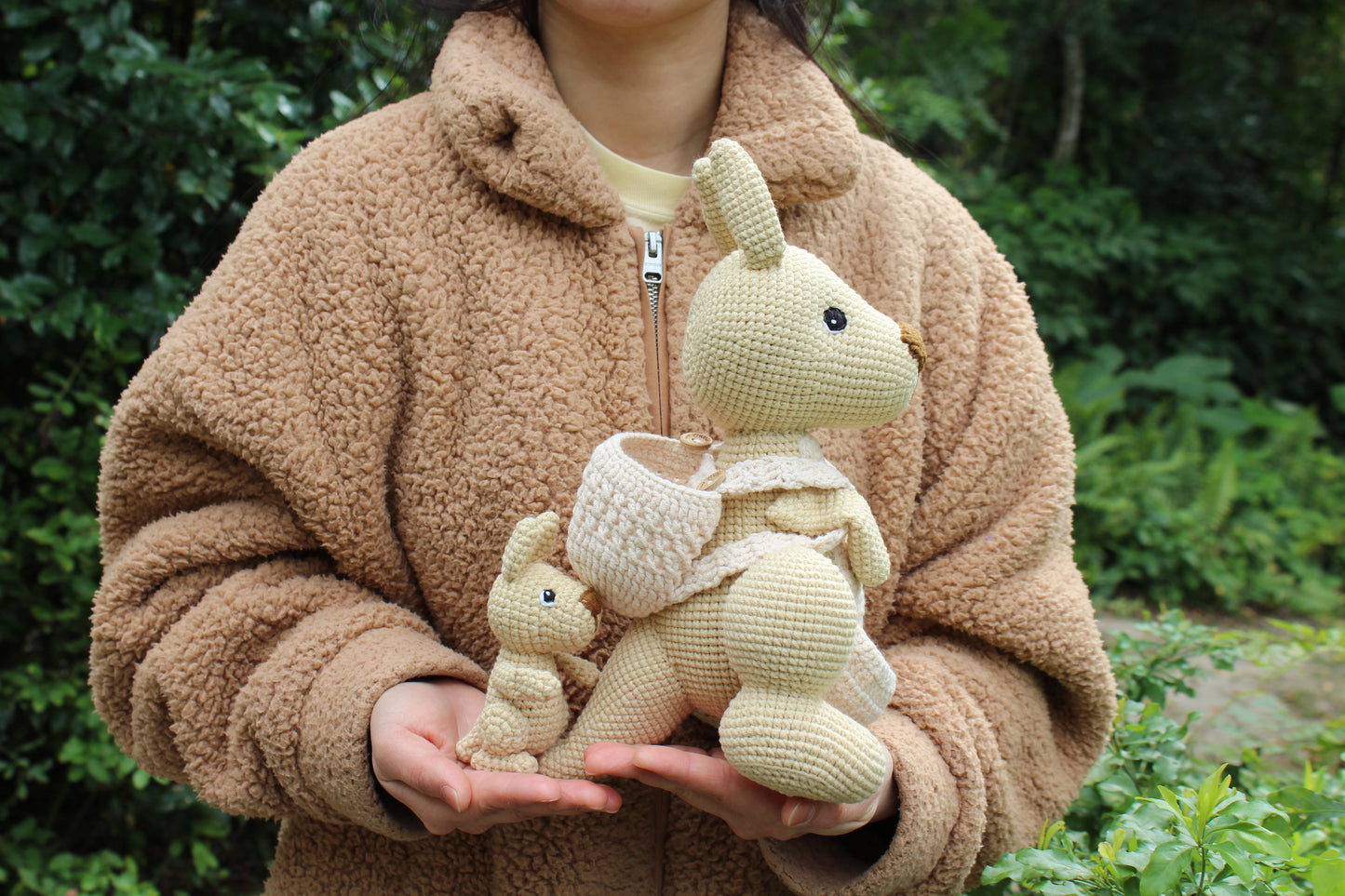 Crochet Kangaroo Set: Handmade beige crocheted kangaroo and joey with button details.