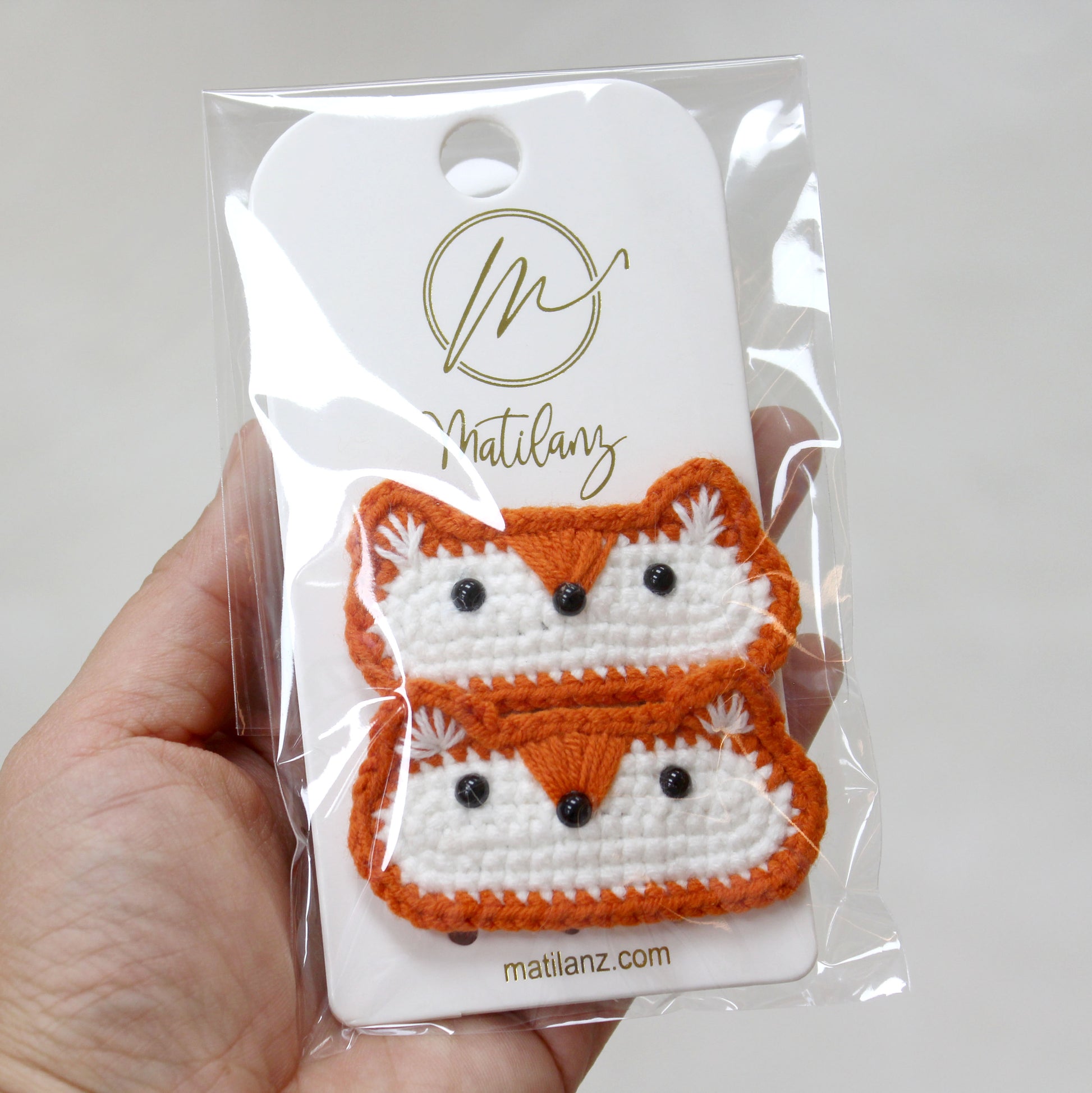 Crochet fox hair clips in orange and white, set of 2.