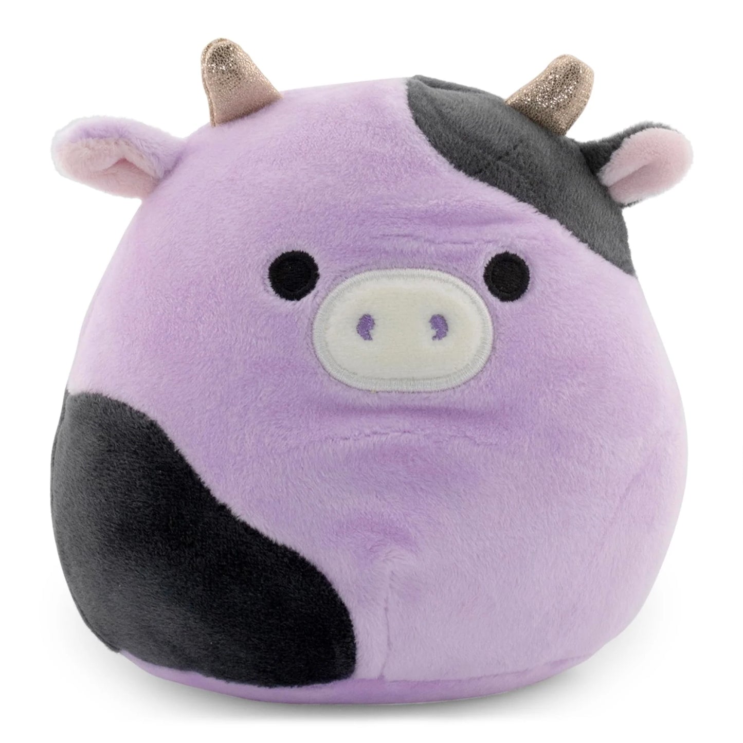 Purple and black cow plush with glittery horns and sleepy eyes