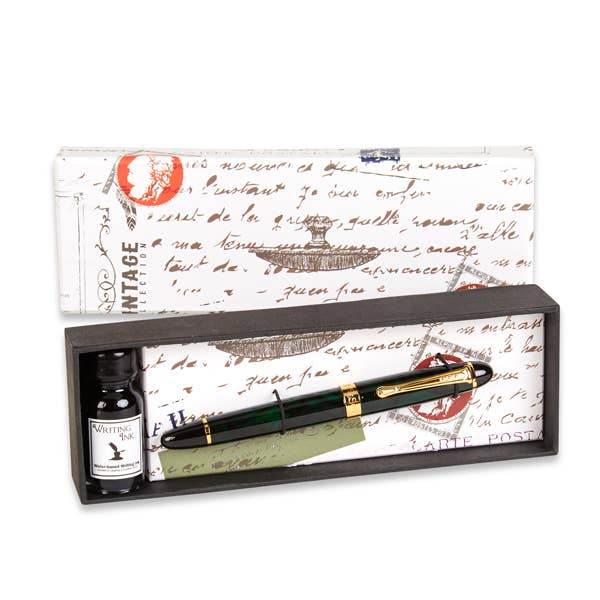 Elegant fountain pen set with a sleek black pen and gold accents, paired with a bottle of ink in a red lacquer finish box.
