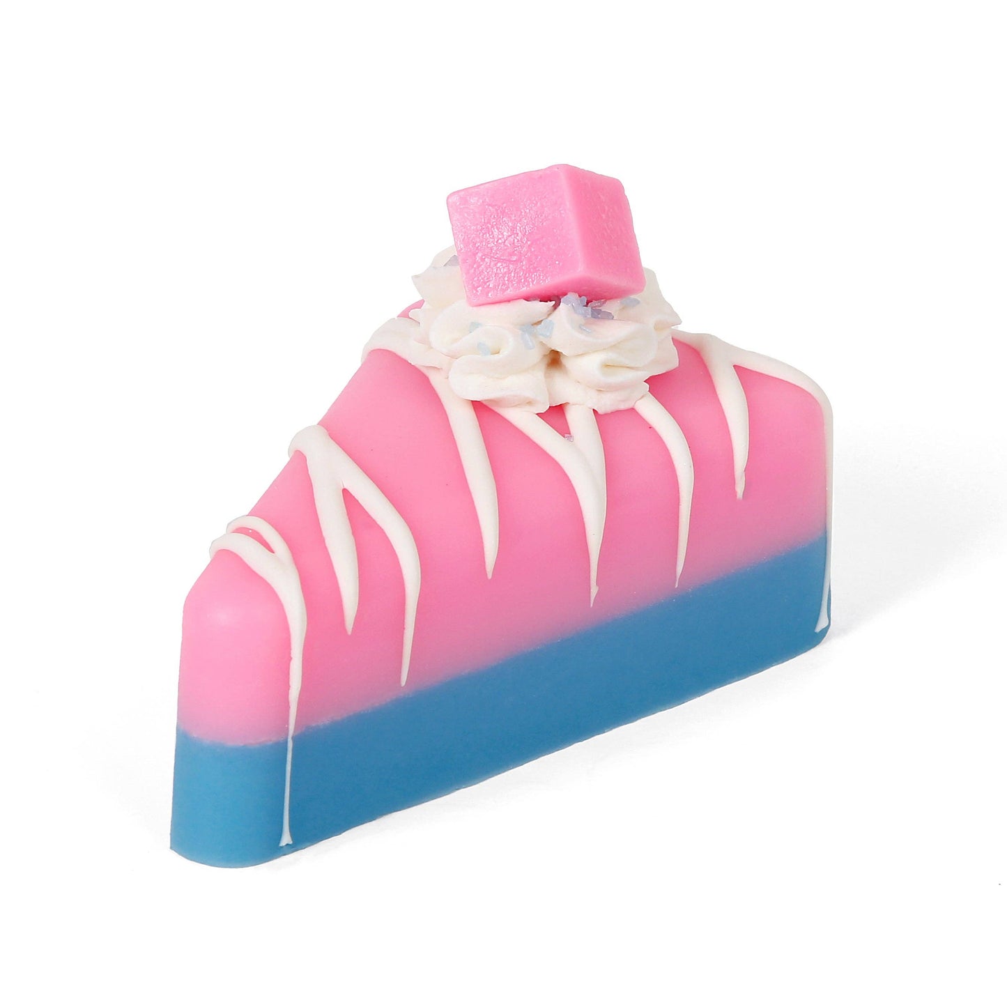 Pink and blue slice-shaped soap with white drizzle and whipped-like topping