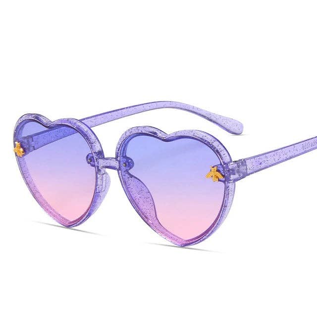Purple glitter heart-shaped sunglasses with gradient pink and blue lenses