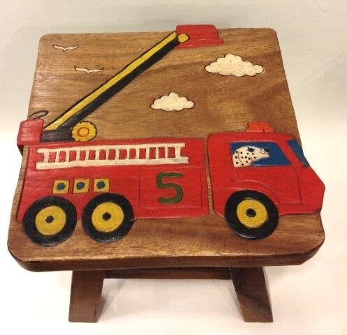 Wooden stool with colorful carved fire truck and Dalmatian dog detail
