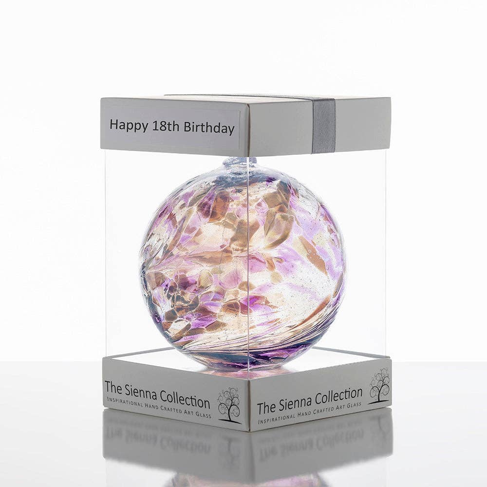 Purple and gold hand-blown glass friendship ball in gift box labeled Happy 18th Birthday