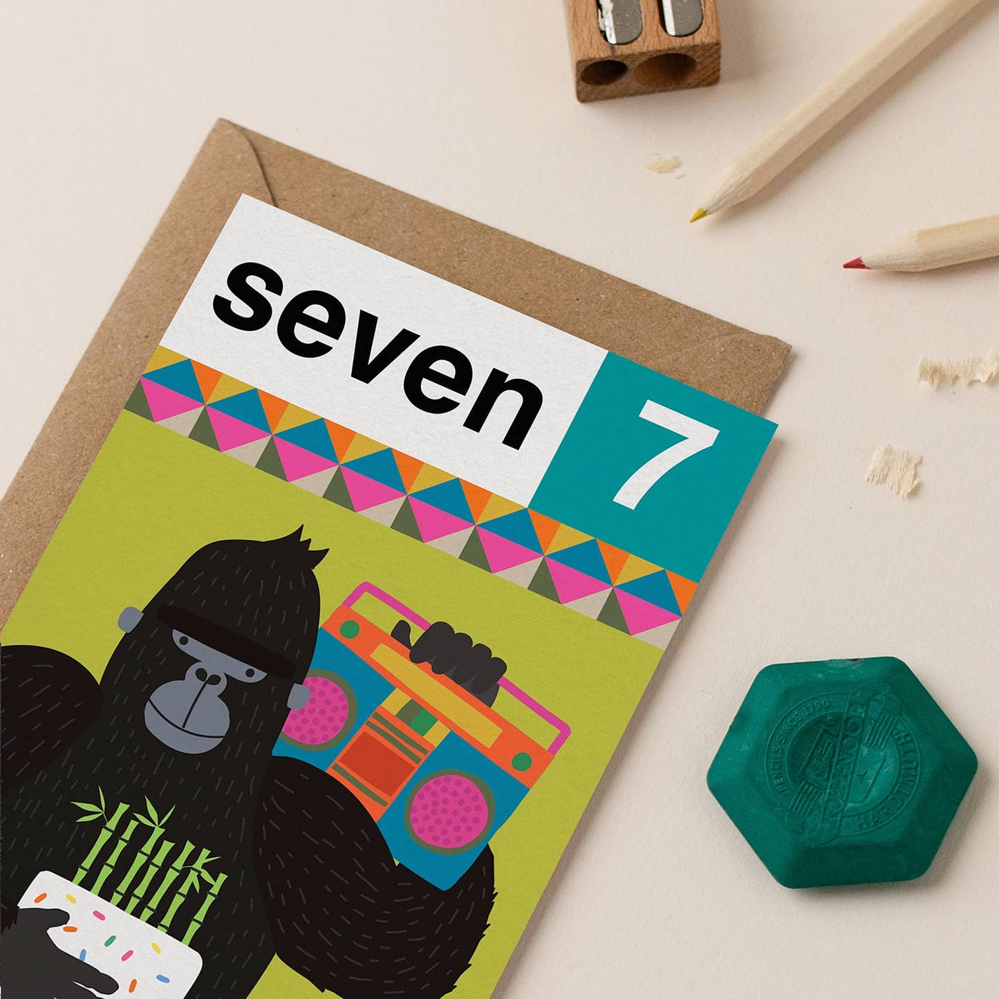 Brightly colored 7th birthday card featuring a fun gorilla with a boombox, perfect for kids.