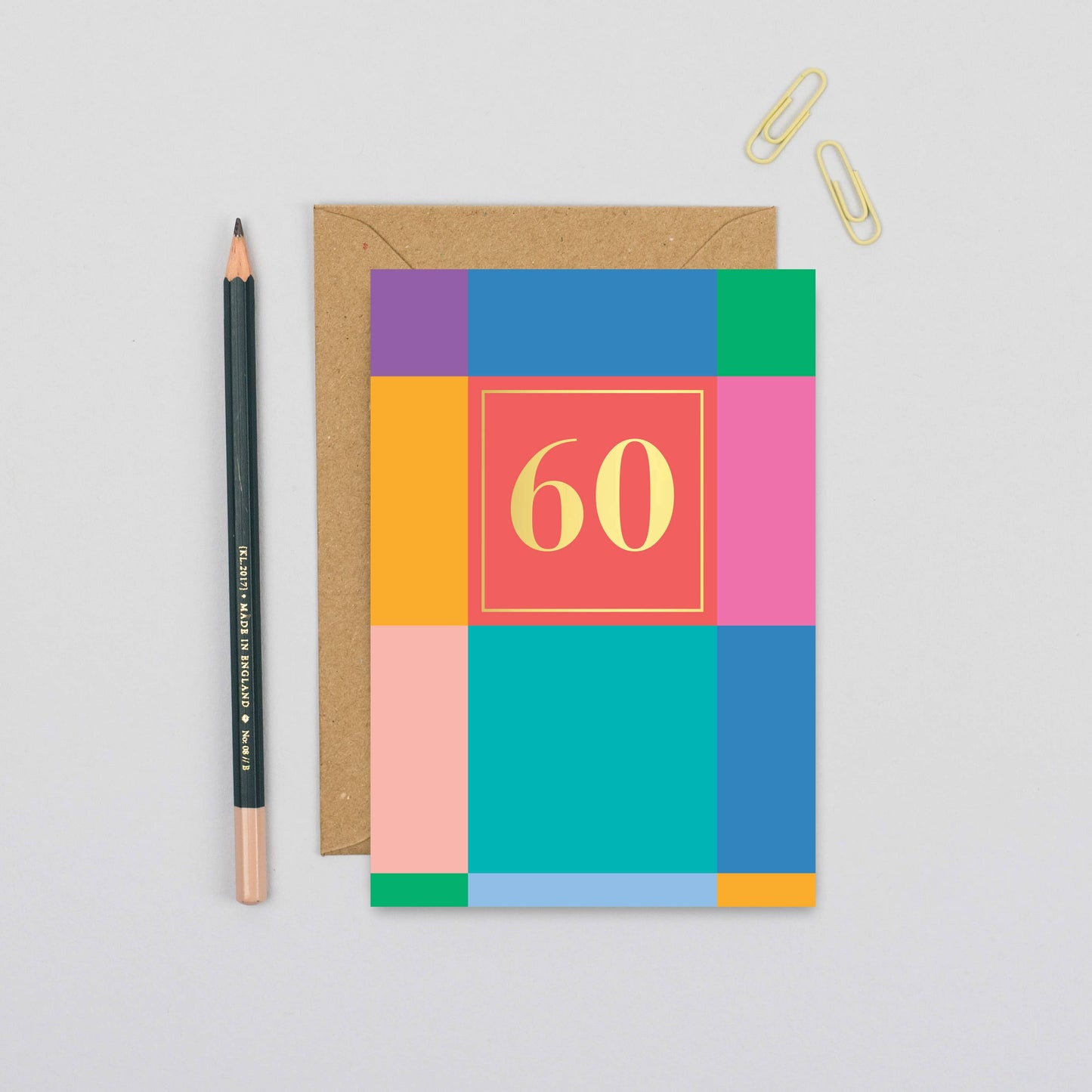 Colorful 60th birthday card with bold block design and gold foil details
