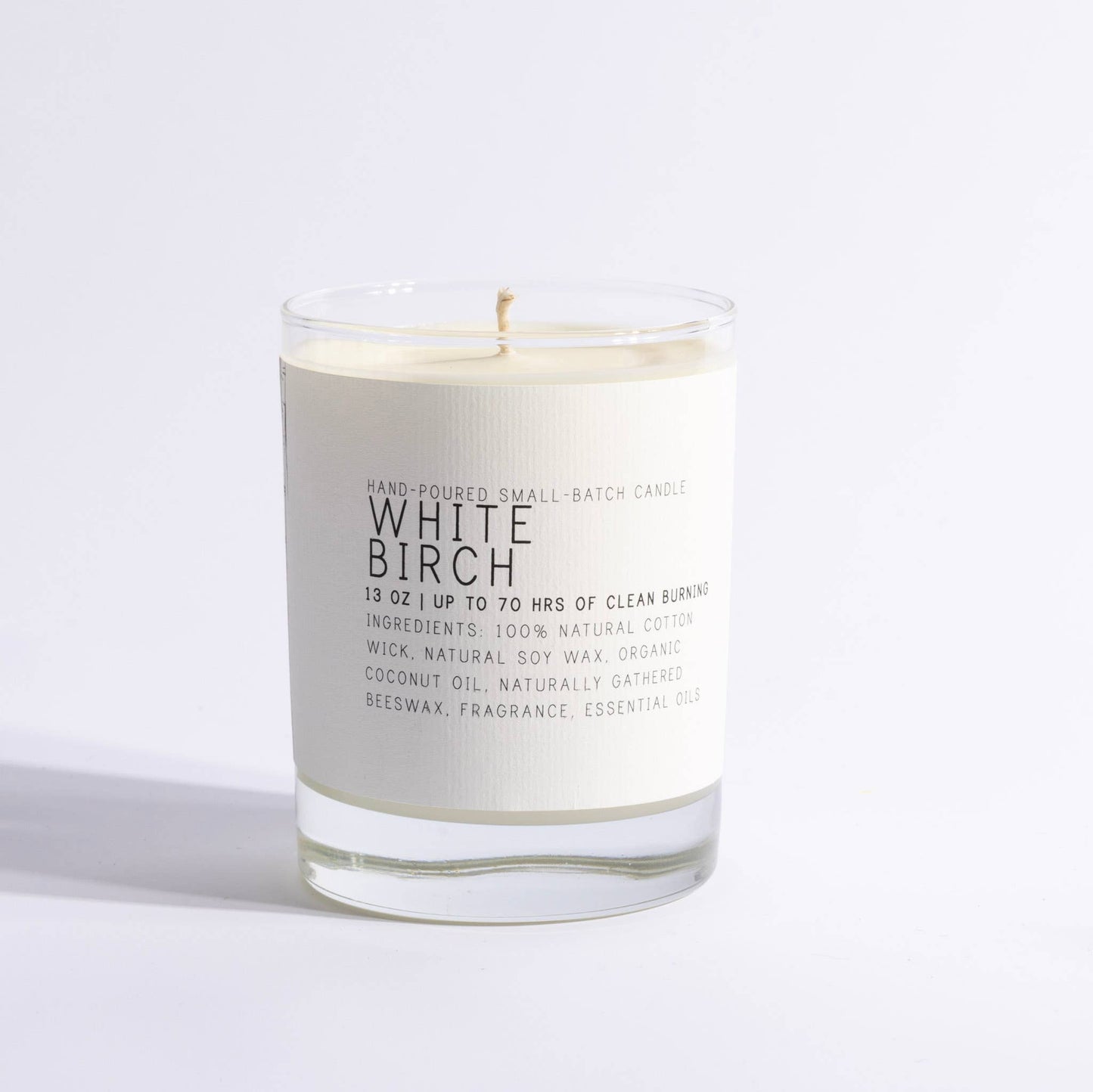 White Birch scented candle in clear glass jar with minimalist label
