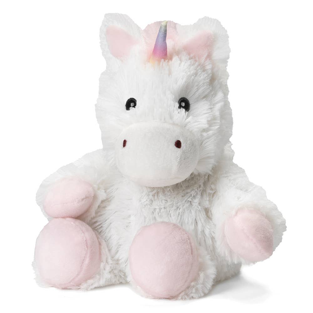 Soft white unicorn plush with pink feet and pastel horn