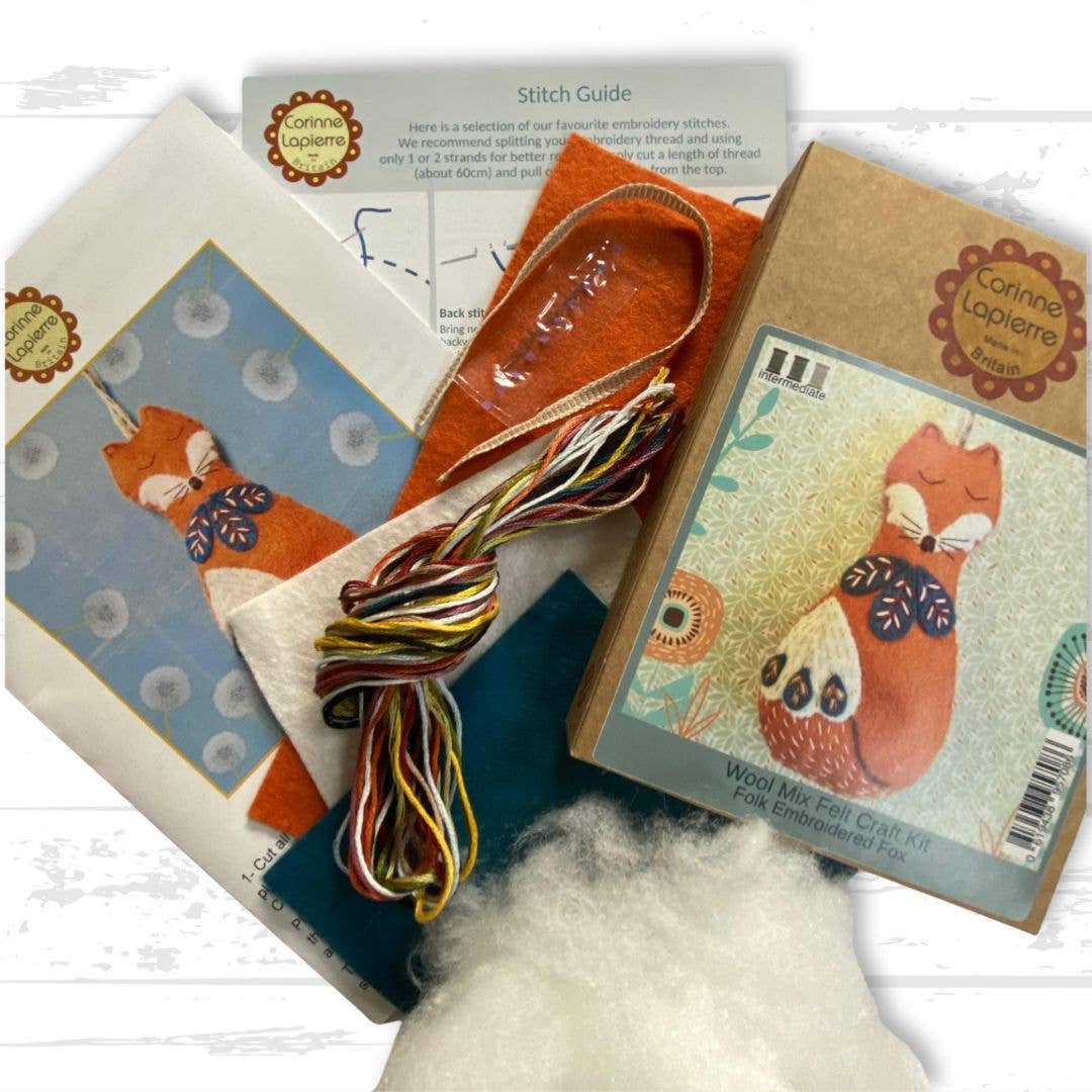 Felt craft mini kit featuring a folk embroidered fox design with colorful threads and a detailed stitch guide.