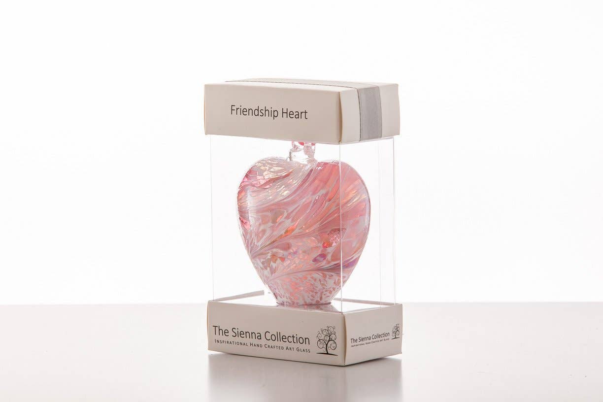 A handcrafted glass friendship heart in vibrant blue, perfect for gifting.