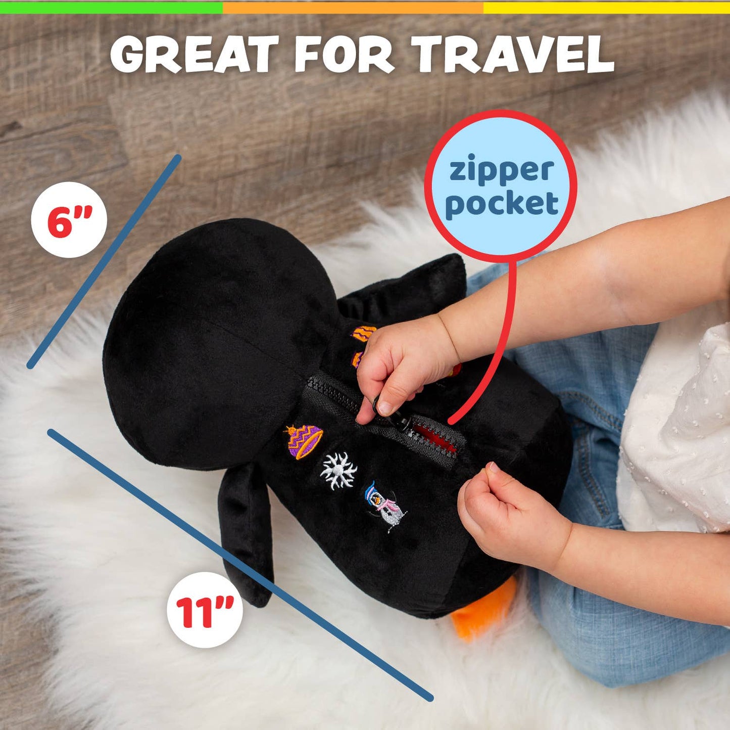 Black plush penguin with colorful educational buckles and a zipper pocket, perfect for kids.