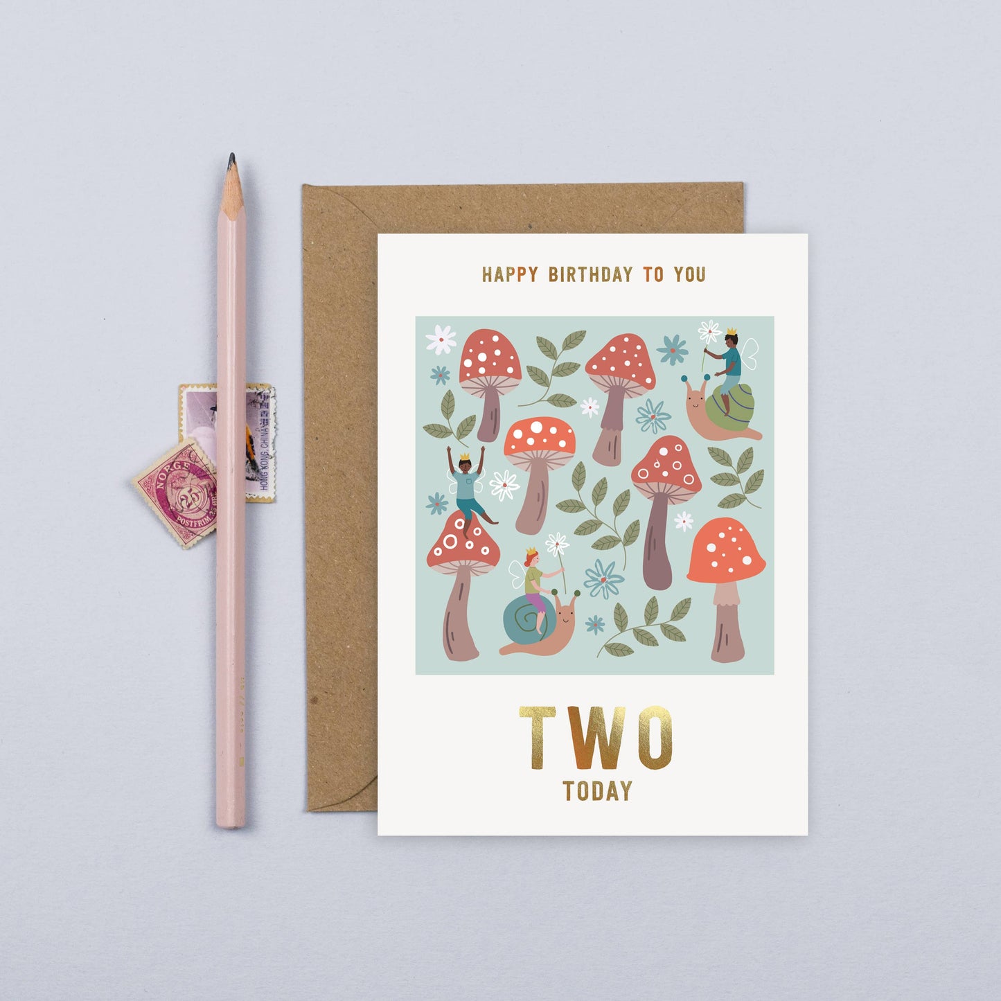 Whimsical toadstool-themed 2nd birthday card with fairies and gold foil text