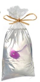 A clear bag with a purple fish-shaped soap inside, tied with a natural twine bow.