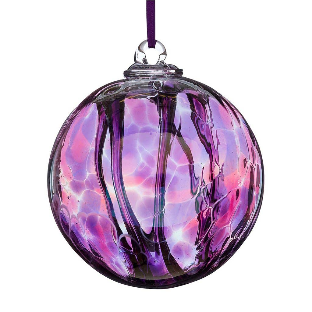 Mouth-blown pink and purple glass spirit ball with abstract swirl design
