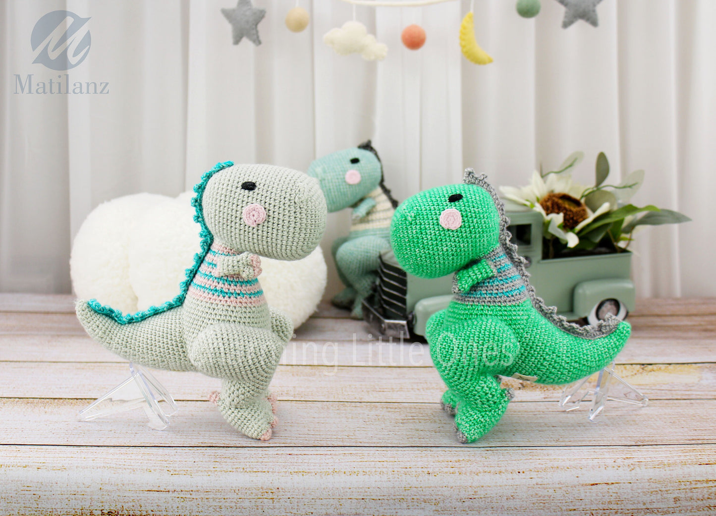 Handmade crochet T-Rex dinosaur, 8 inches tall, with colorful stripes and a playful design.