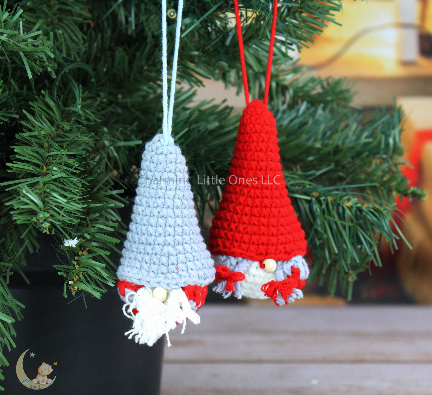 Handmade crochet Christmas snowman ornaments, 4 inches tall, with red and white hats and festive bows.