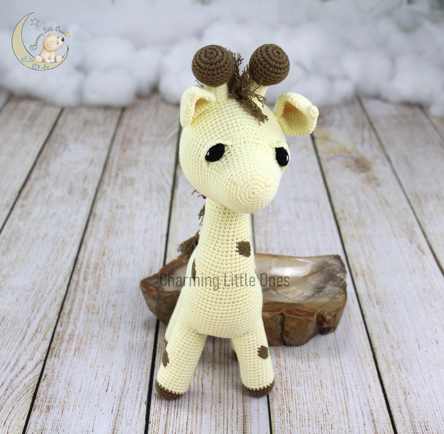 Handmade crochet giraffe with soft cream and brown spots, standing tall at 14.5 inches.